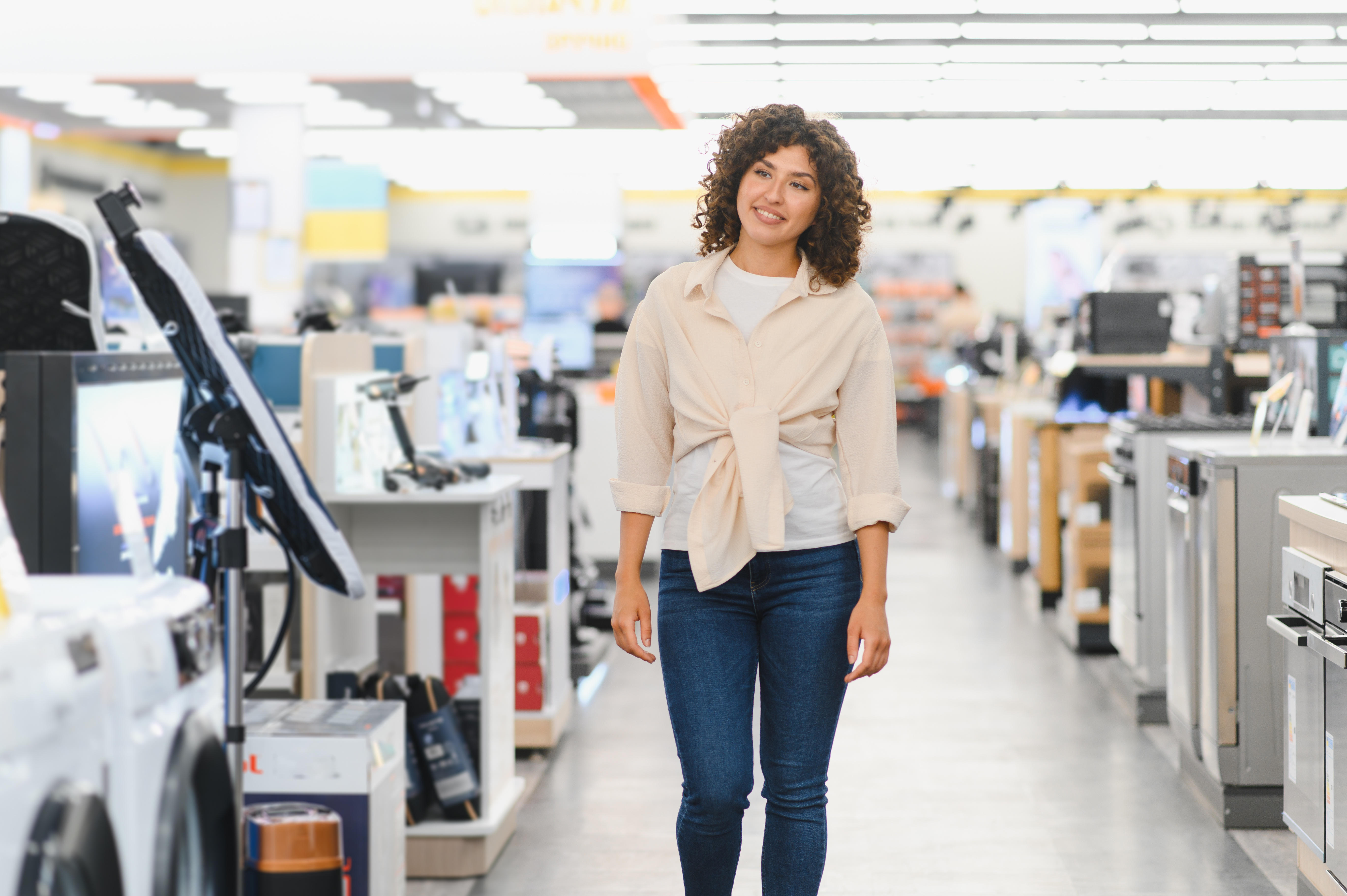 Woman shopping in appliane store