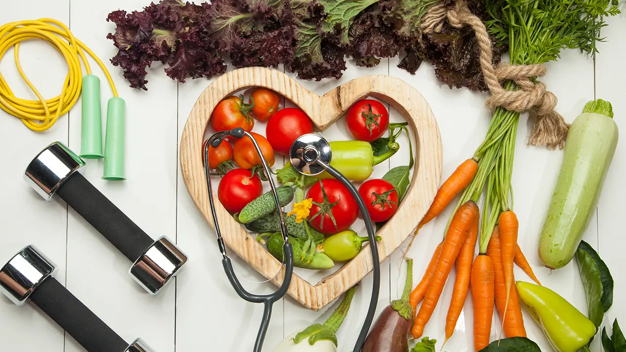 A platter of vegetables and workout equipment