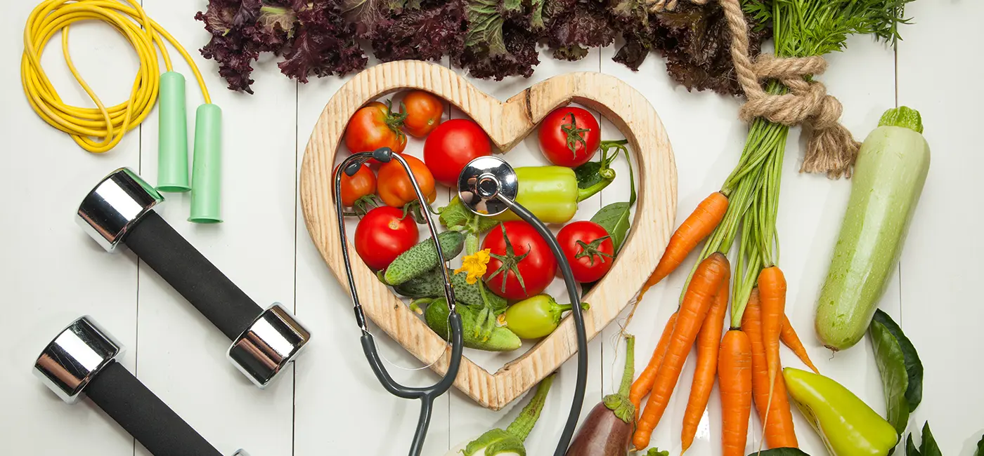 A platter of vegetables and workout equipment
