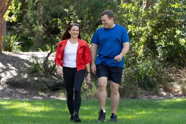 Georgie walking outside with a friend
