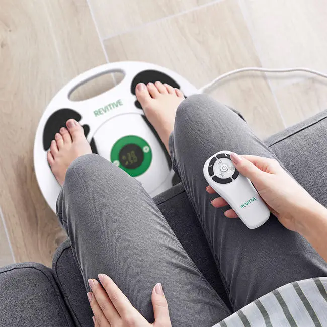 Woman with feet on a ProRelief device