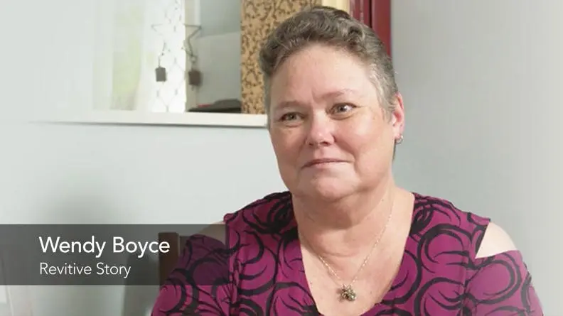 Wendy looking at the camera smiling