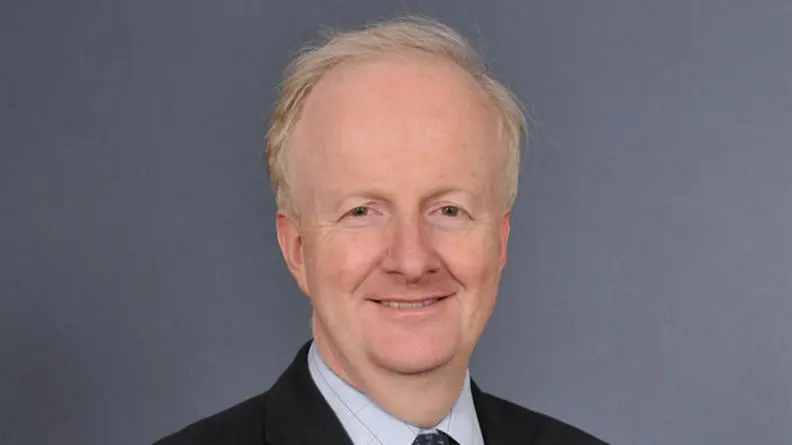 Professor Alun Davies smiling at the camera