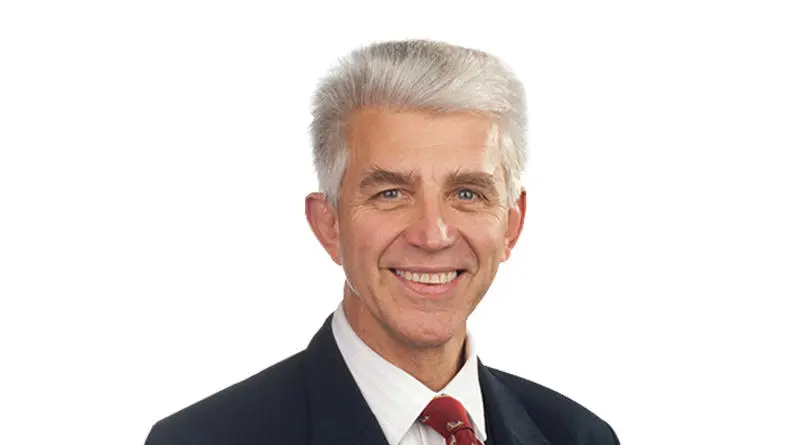 Professor Jonathan Beard smiling at the camera