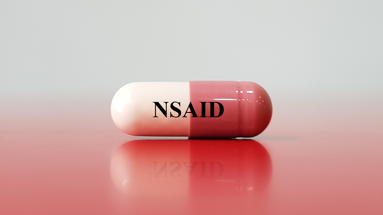 Image of a tablet with NSAID written on it 